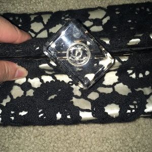 Floral, black and white small Chanel clutch